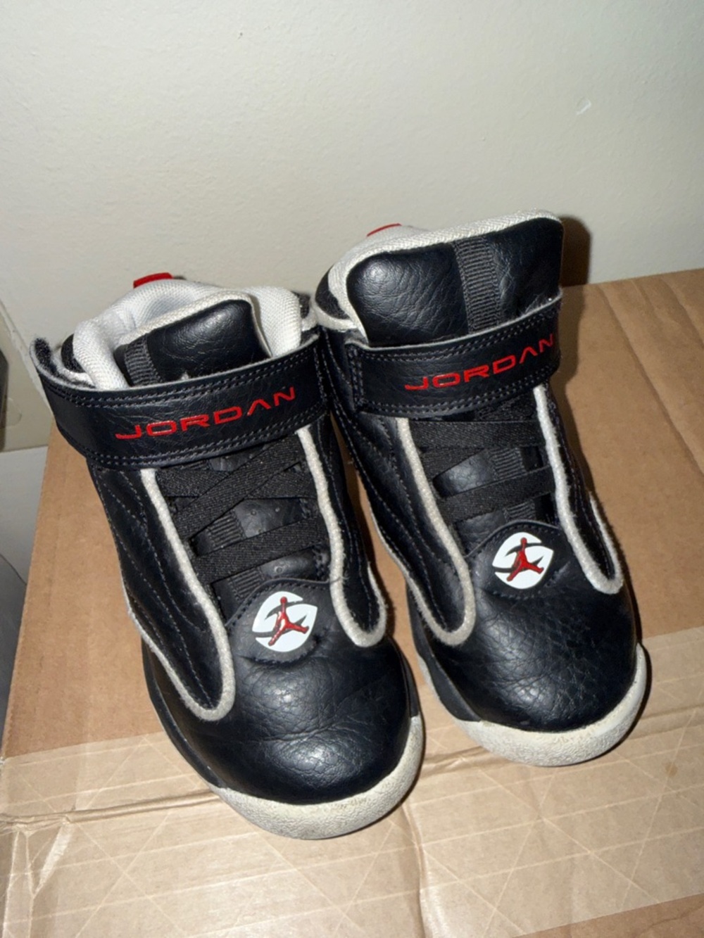Jordan Kids Black and Red High-Top Sneakers